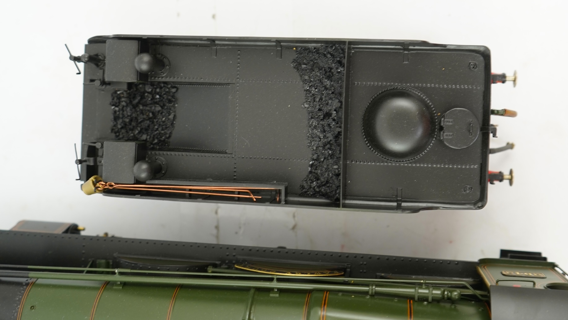 A Gauge One model of GWR Saint Class Fawley Court 2942, 4-6-0 tender locomotive, the model is unpowered, possibly to allow for the detailing between the frames.